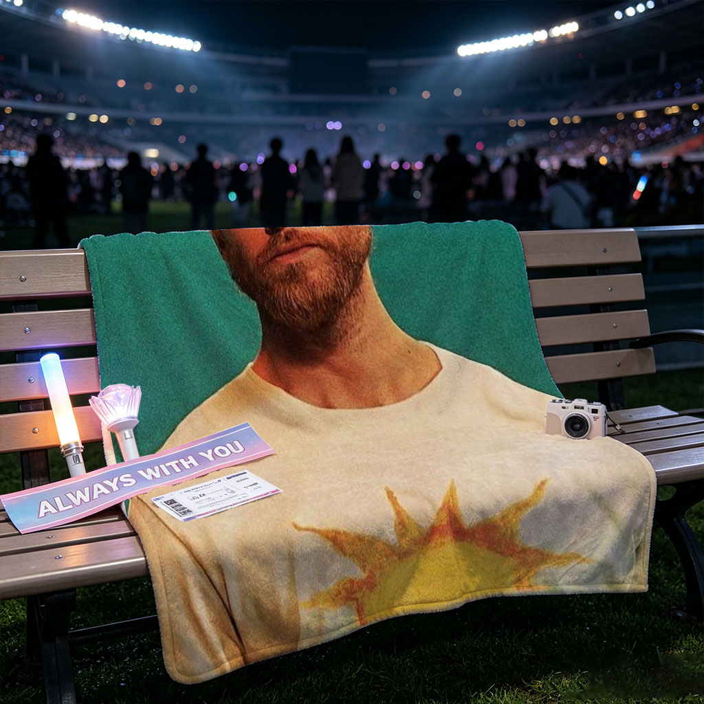 Calvin Harris in a Sun-Themed T-Shirt Against a Teal Background - Blankets