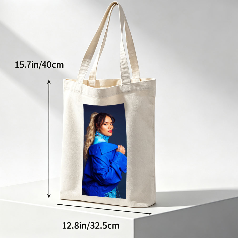 Rita Ora in Bold Blue Fashion Pose Against Dark Background - Canvas tote bags