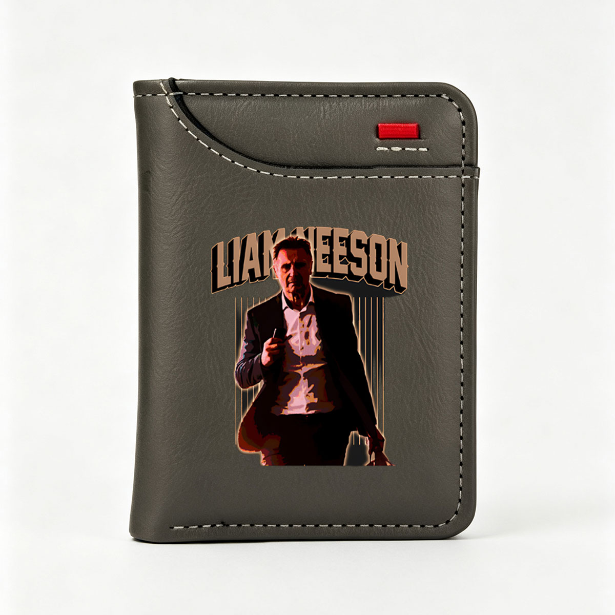 Liam Neeson in a dramatic pose, holding a phone, with bold text above him. - Vertical Style Wallet