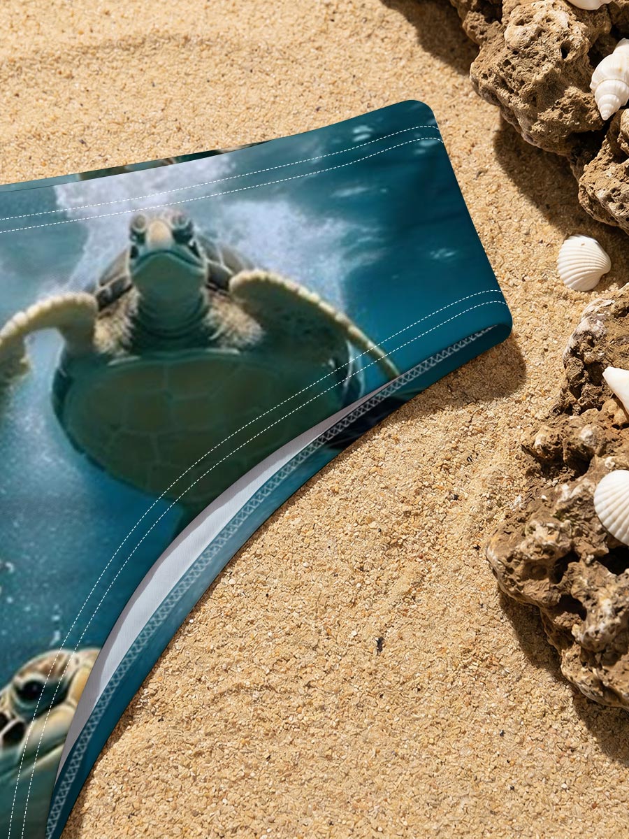 Three sea turtles swimming gracefully underwater in clear blue ocean. -  Men's swim trunks