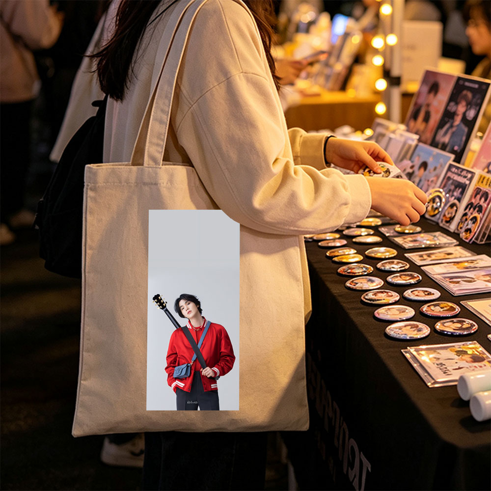 Jungkook with Guitar in Red Jacket and Blue Bag, Standing Against Gray Background - Canvas tote bags