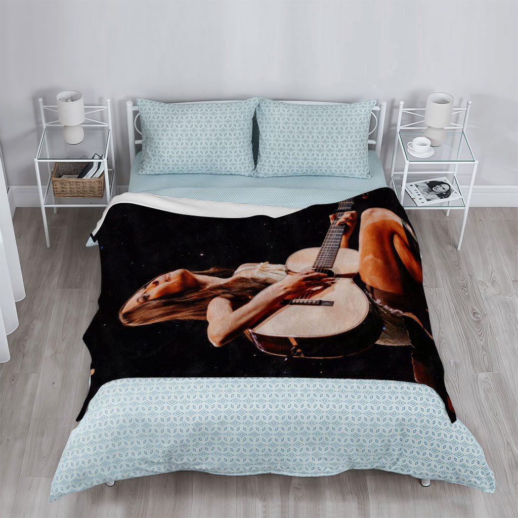 Lana Del Rey Playing Acoustic Guitar on Stage in a Starry Night Setting - Blankets
