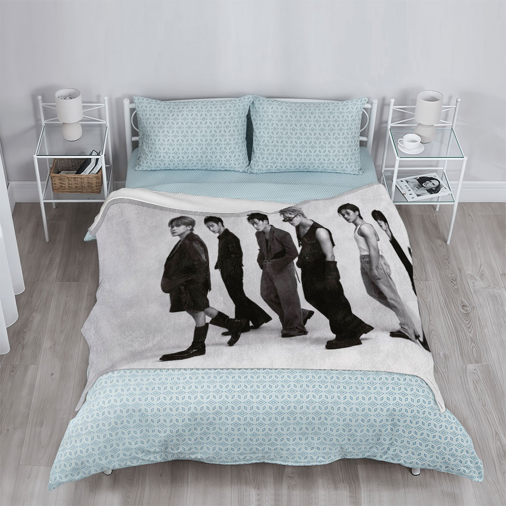 BTS Members in a Stacked Pose Against a Minimalist Background - Blankets