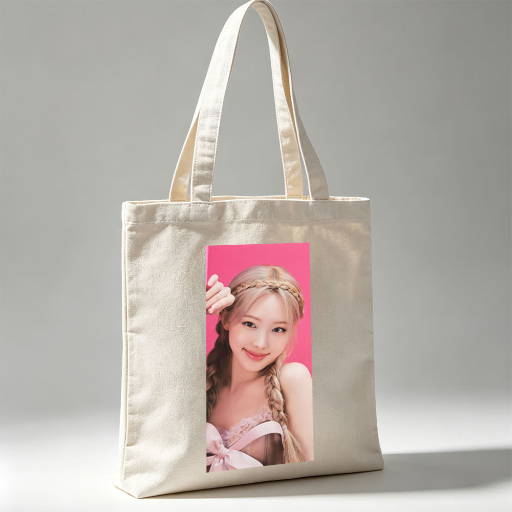 LISA from BLACKPINK in a Sweet Pink Outfit with Braided Hair and Soft Smile - Canvas tote bags