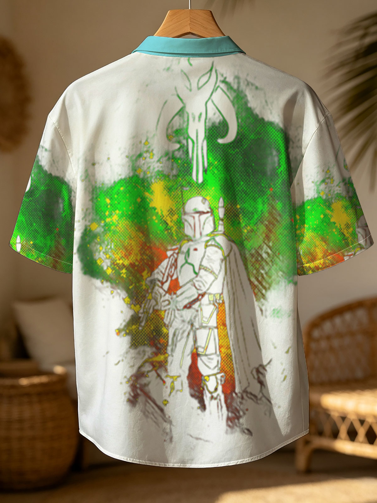 Din Djarin, The Mandalorian, stands in silhouette against a vibrant green and yellow cosmic backdrop, with the iconic Mandalorian symbol above. -  Shirt