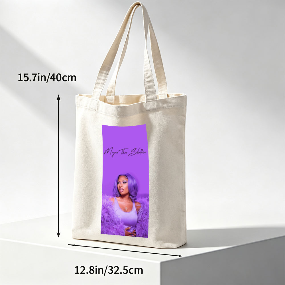 Megan Thee Stallion in Purple Feathered Outfit Against Vibrant Purple Background - Canvas tote bags