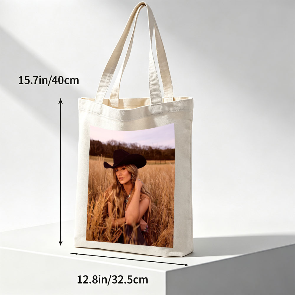Paris Hilton in a Field of Golden Grass Wearing a Black Cowboy Hat and Boho Outfit - Canvas tote bags