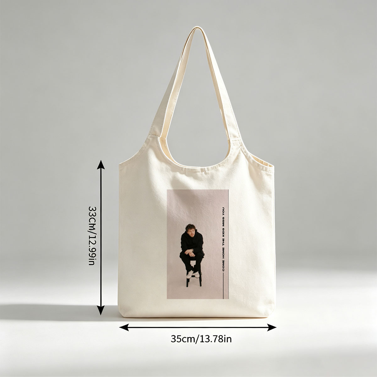 The Kids Come Home Miss You Album Cover Featuring Artist in Black Outfit Sitting on Stool - Canvas shoulder bags/