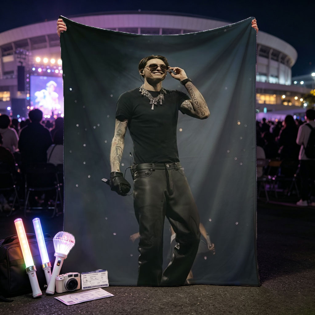 Machine Gun Kelly on Stage Performing in Black Outfit with Tattoos and Sunglasses - Blankets
