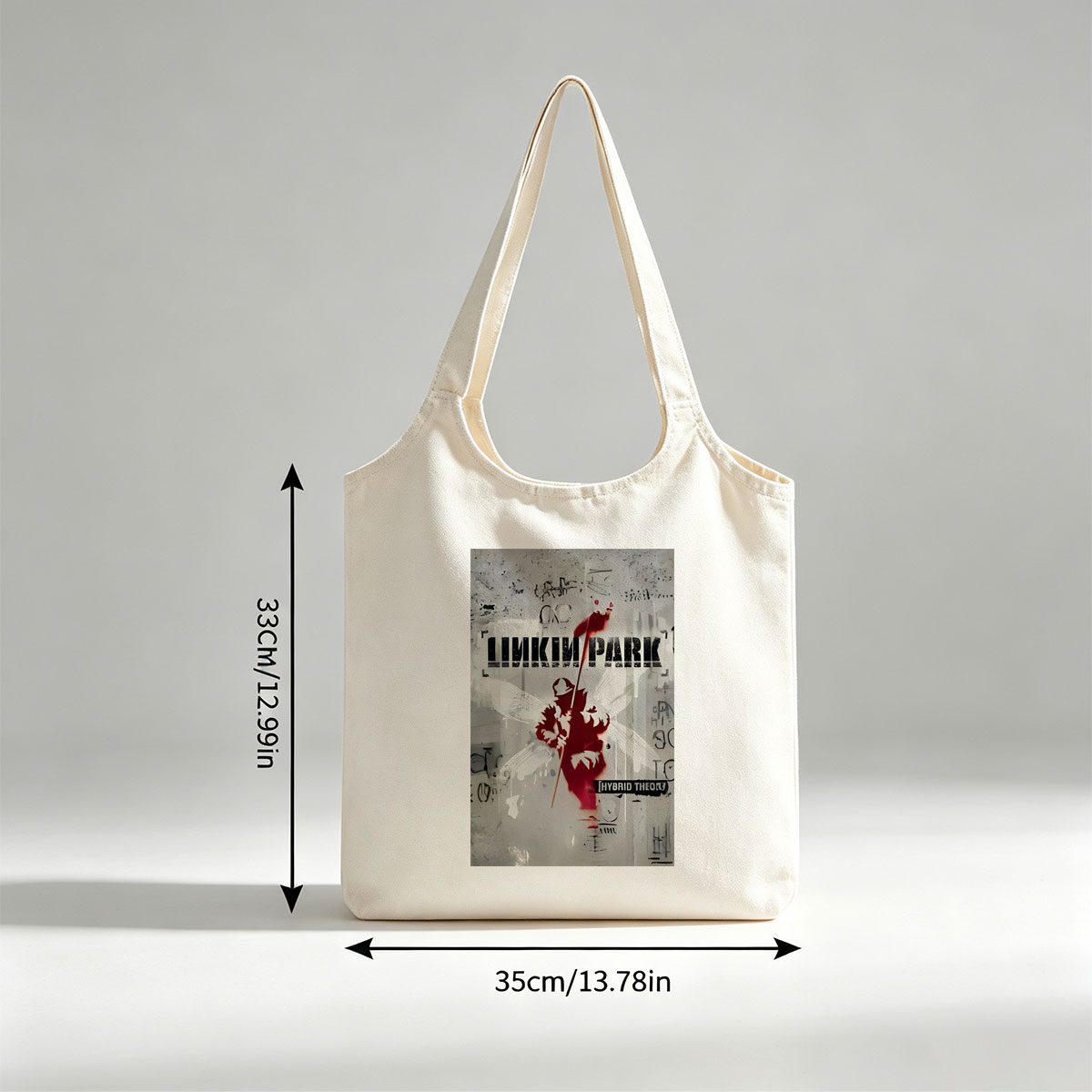 Linkin Park Album Cover Featuring a Red Silhouette of an Angel with Wings and a Spear Against a Graffiti-Style Background - Canvas shoulder bags/
