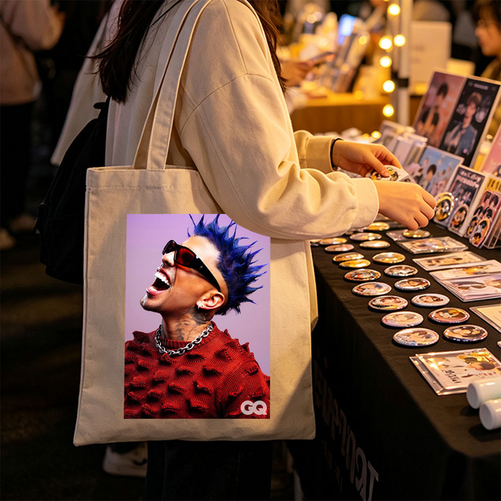 Daddy Yankee in a Bold Red Sweater with Spiky Blue Hair and Sunglasses, Laughing Loudly Against a Purple Background - Canvas tote bags
