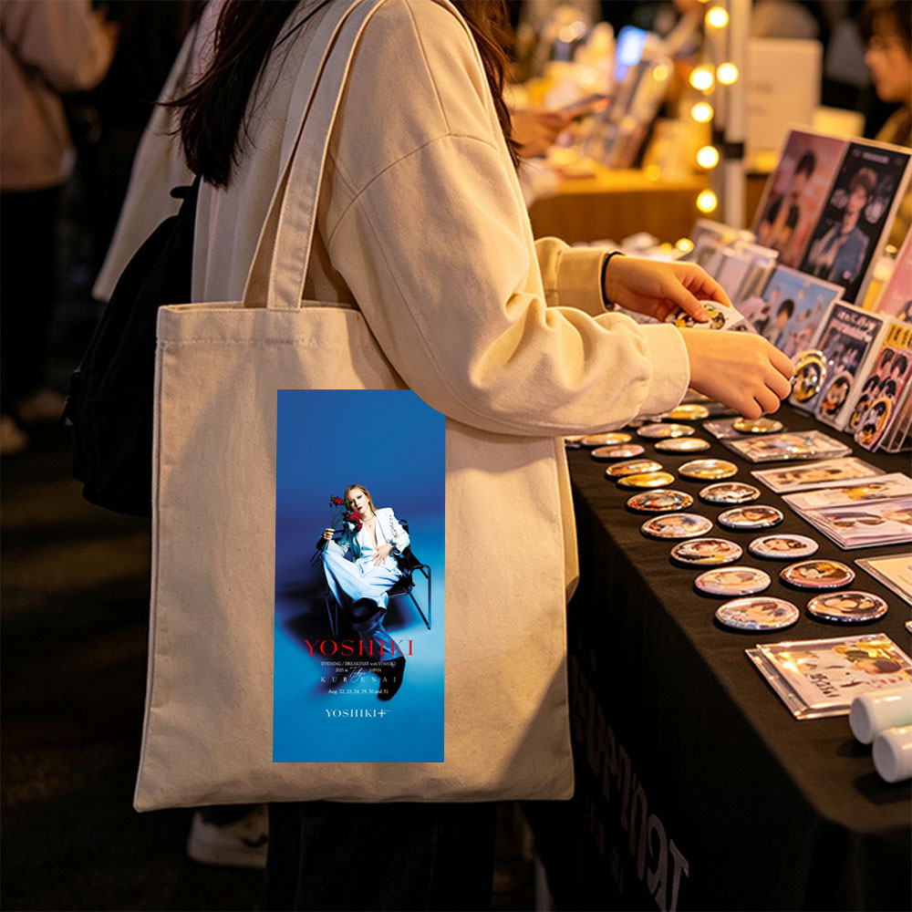 YOSHIKI Evening Breakfast with YOSHIKI 2025 in Tokyo Japan KURENAI Poster Featuring YOSHIKI Seated on Chair Holding Red Roses Against Blue Background - Canvas tote bags