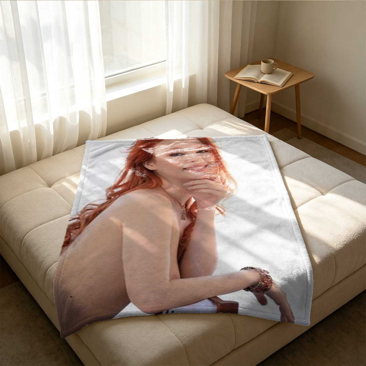 A smiling young woman in a white shirt and blue panties lying on a bed. - Blanket