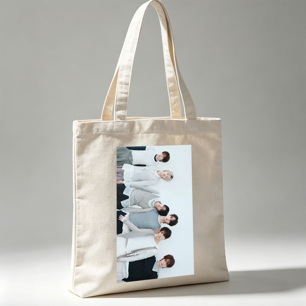 TOMORROW X TOGETHER Members Lying on White Background in Coordinated Outfits - Canvas tote bags