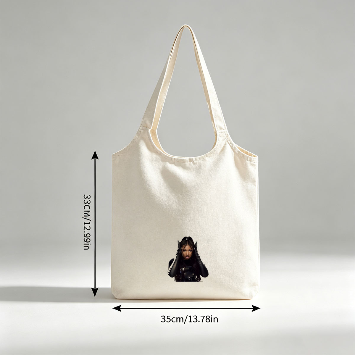 Megan Thee Stallion in a Bold Black Outfit with Hands on Head Against White Background - Canvas shoulder bags/