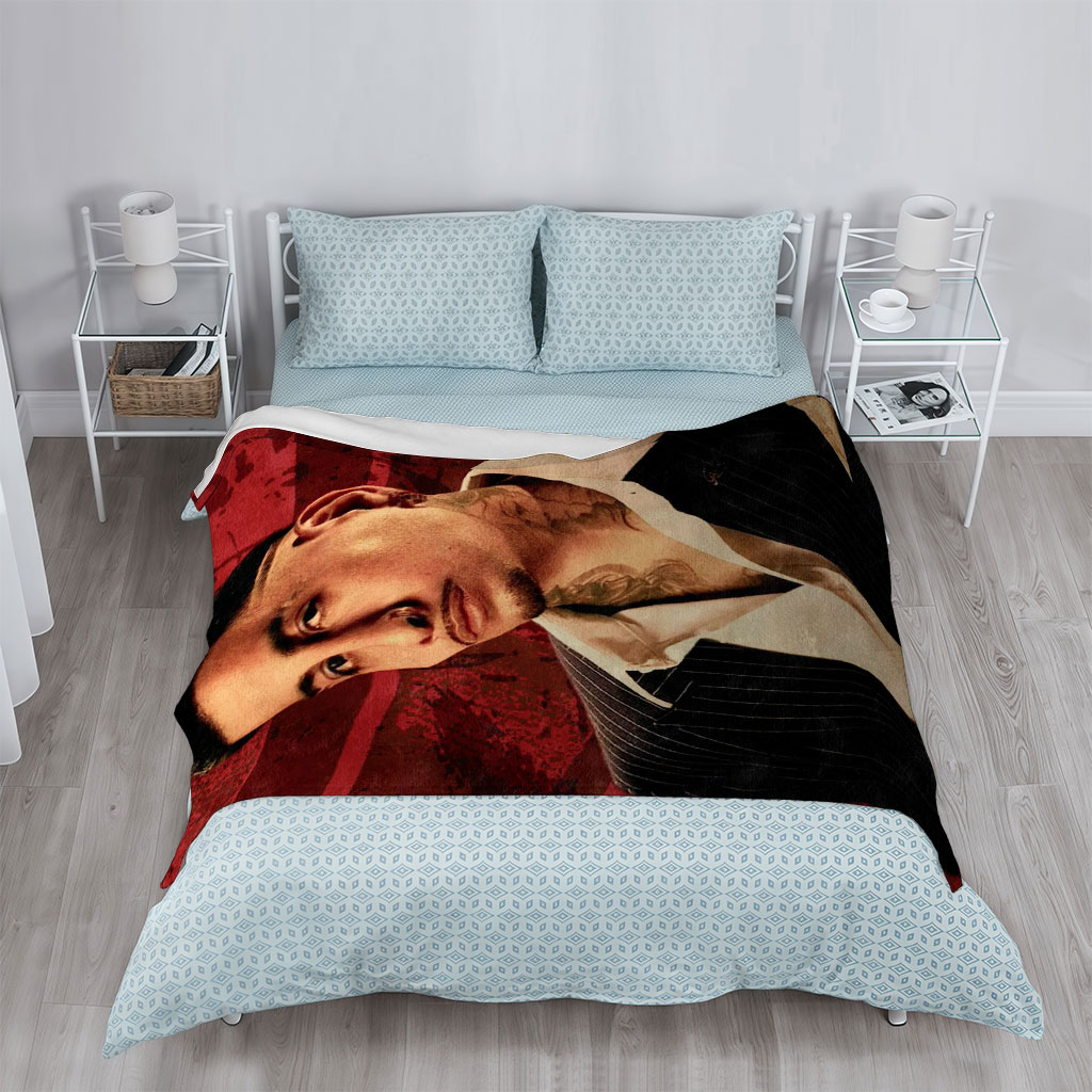Bad Bunny in a Sharp Suit with Visible Neck Tattoos Against a Red Grunge Background - Blankets