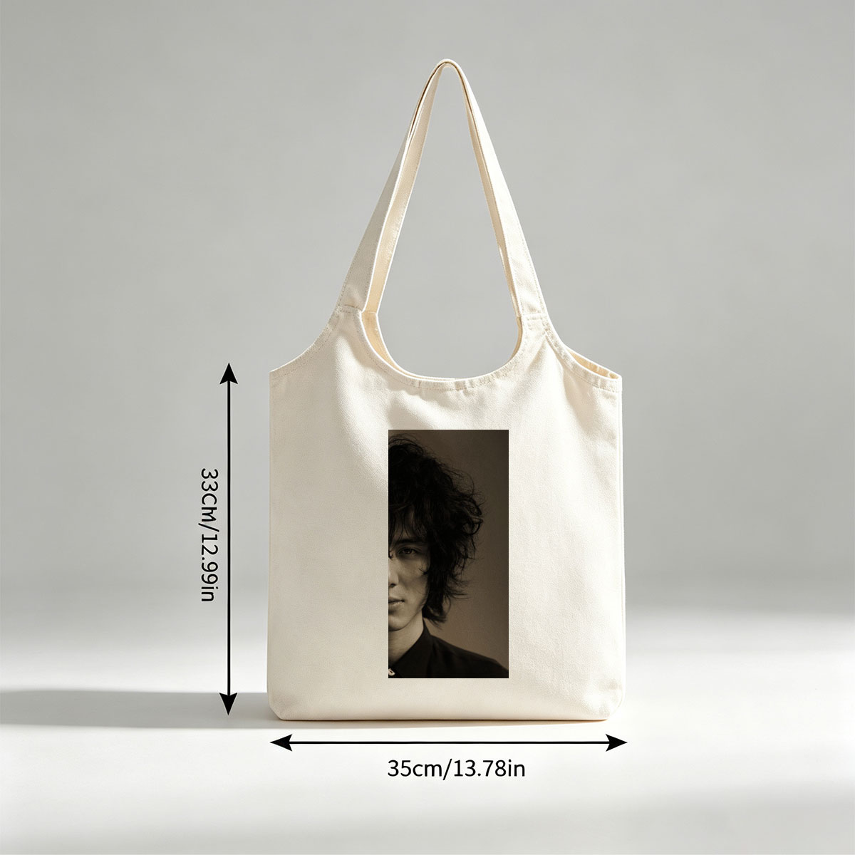 Evan Peters in a Dramatic Portrait with Messy Hair and Intense Gaze - Canvas shoulder bags/