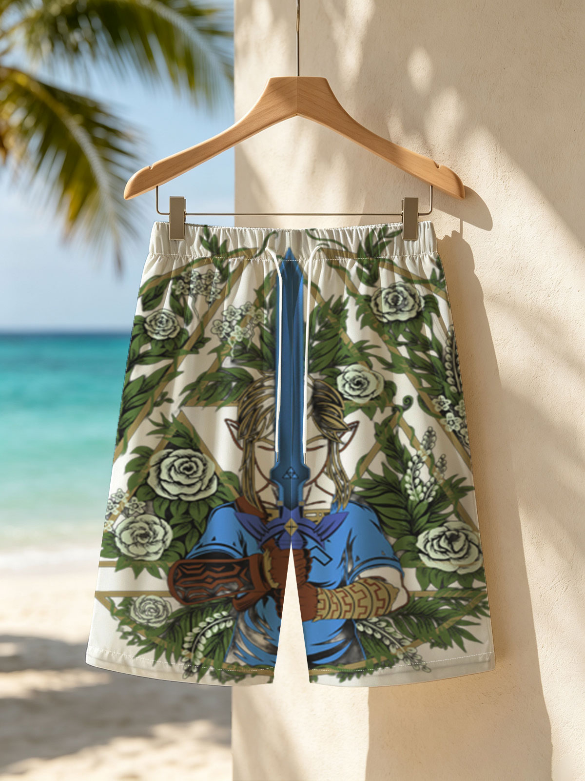 Link from The Legend of Zelda holding Master Sword, surrounded by floral wreath and geometric design -  Beach shorts