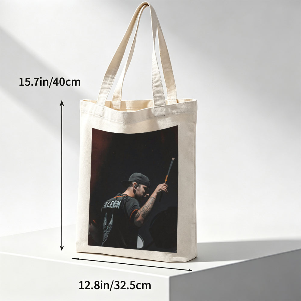 Brent Hinds of Mastodons Performing on Stage with Drumstick in Hand - Canvas tote bags