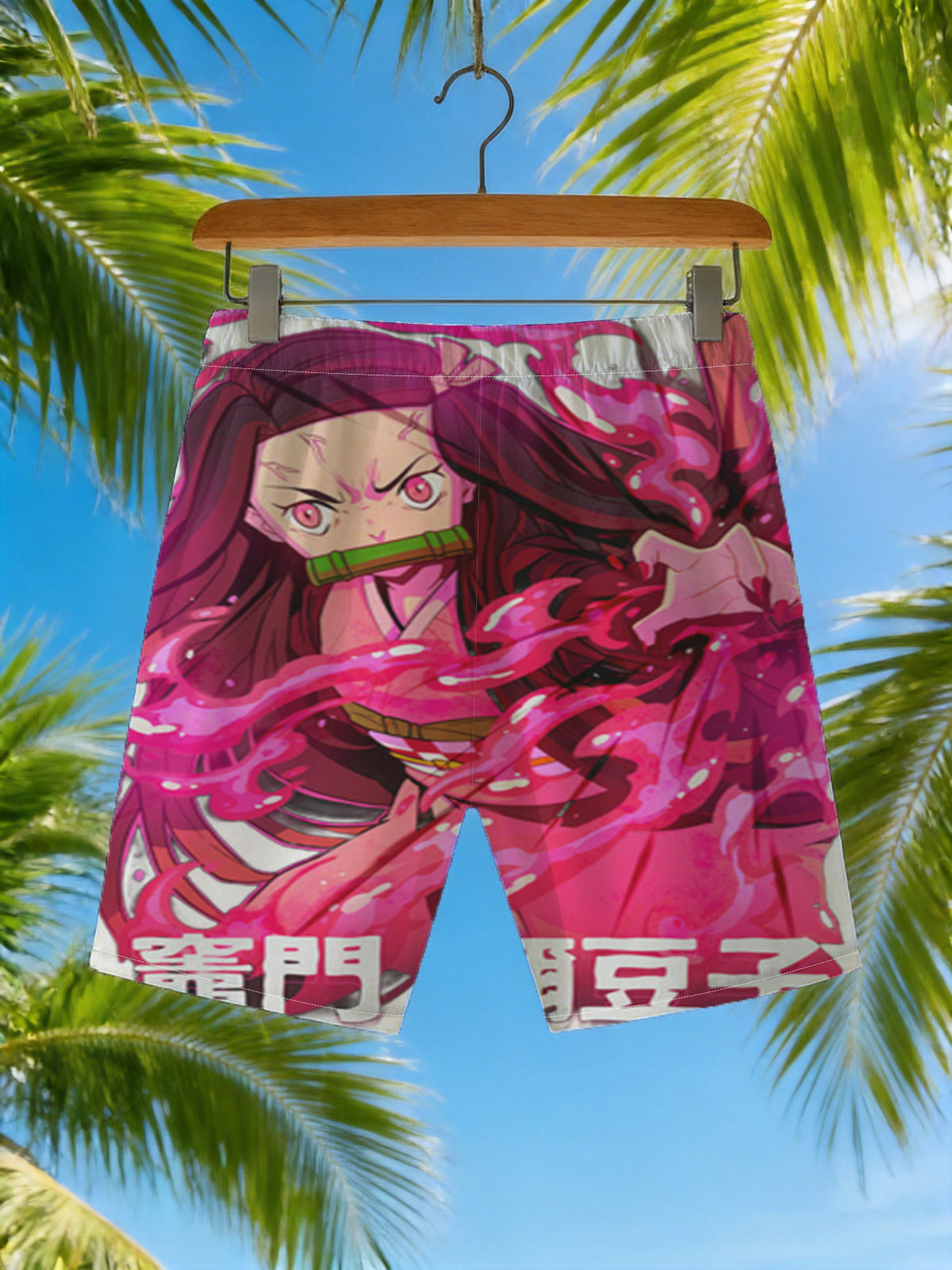 Nezuko Kamado from Demon Slayer: Kimetsu no Yaiba, depicted with intense pink flames and a fierce expression, showcasing her transformation. -  Beach shorts