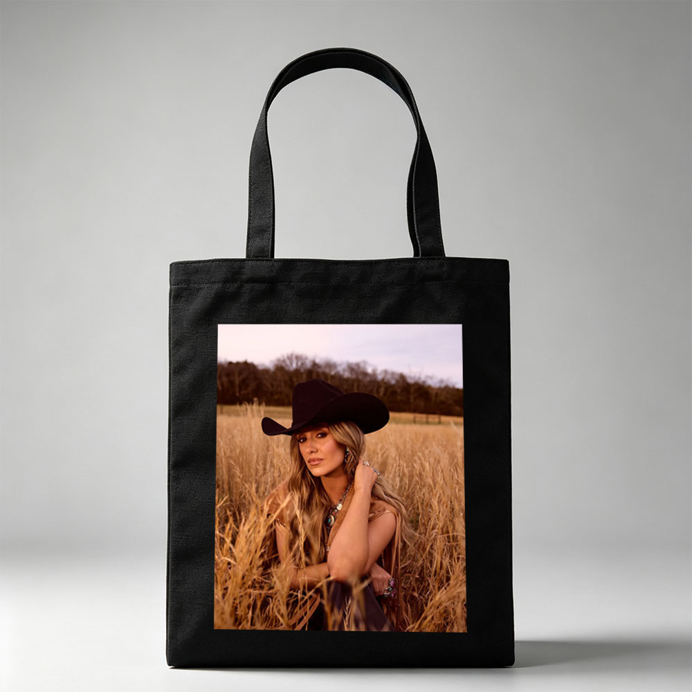 Paris Hilton in a Field of Golden Grass Wearing a Black Cowboy Hat and Boho Outfit - Canvas tote bags