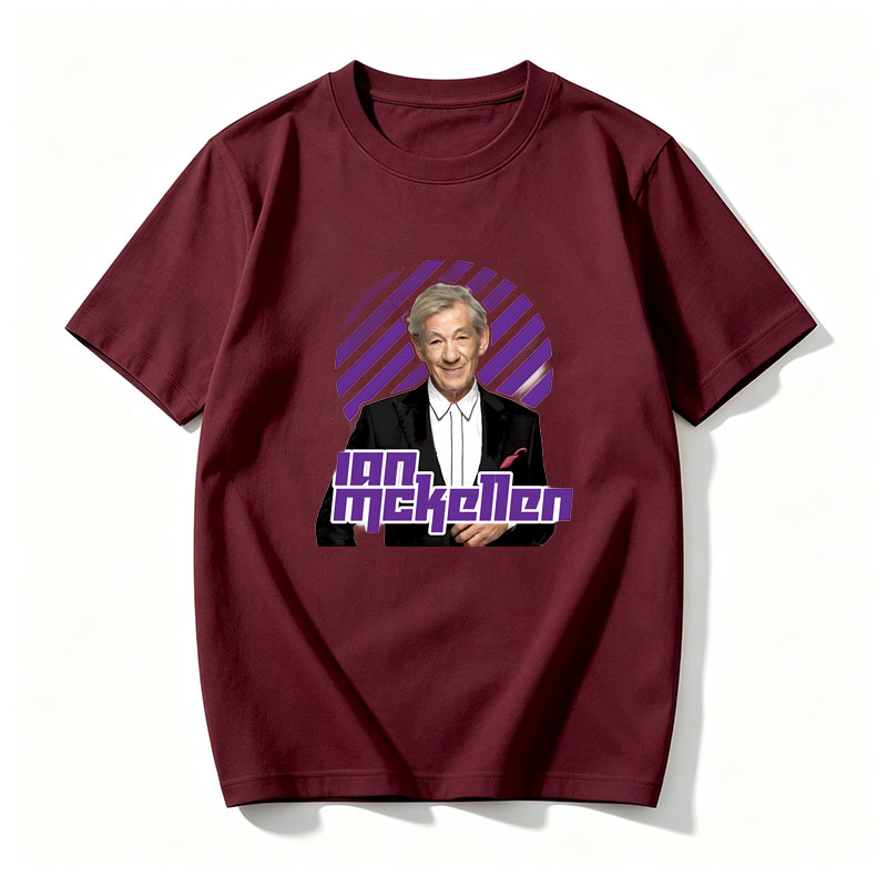 Ian McKellen in a formal suit with a purple and black striped background - Tee