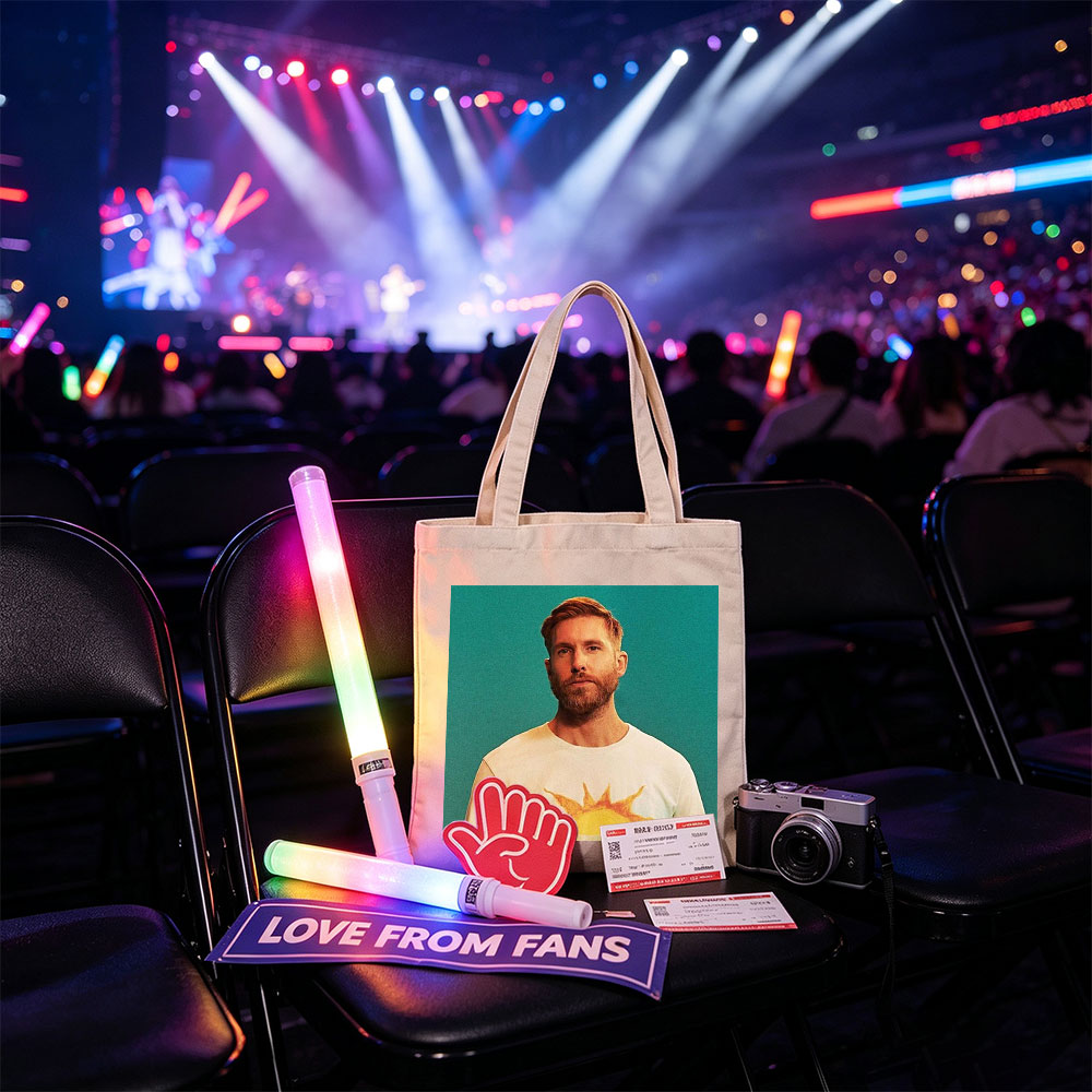 Calvin Harris in a Sun-Themed T-Shirt Against a Teal Background - Canvas tote bags