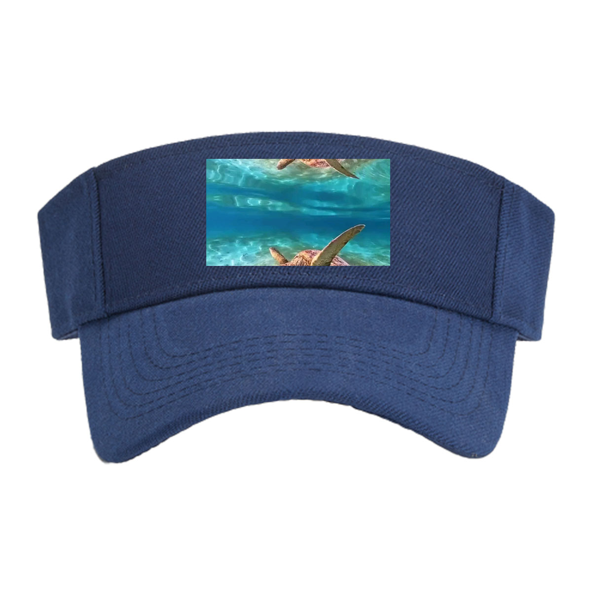 Sea turtles swim gracefully in clear blue waters, one near the surface and one gliding over sandy ocean floor. -  Visor cap