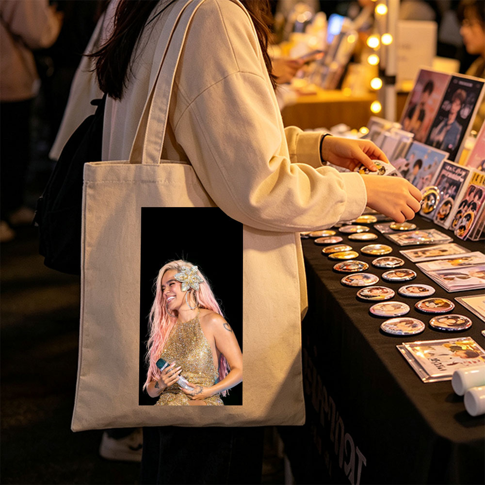 Demi Lovato on Stage in a Sparkling Gold Dress with Pink Hair and Flower Accessory - Canvas tote bags