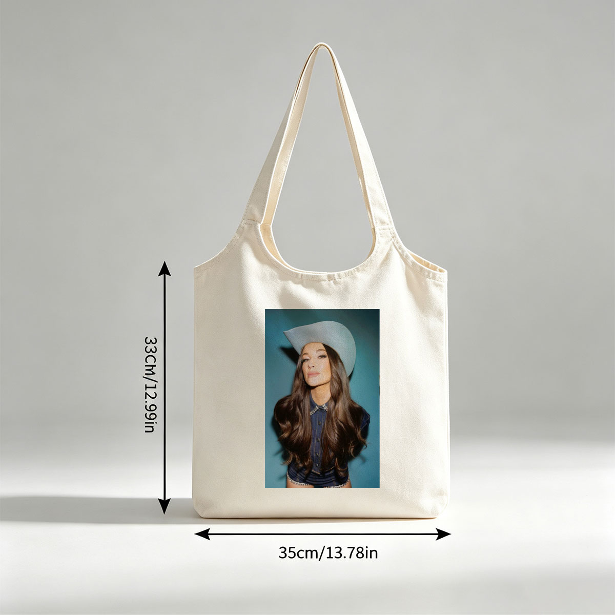 Kacey Musgraves in a Cowboy Hat and Denim Outfit Against a Blue Background - Canvas shoulder bags/