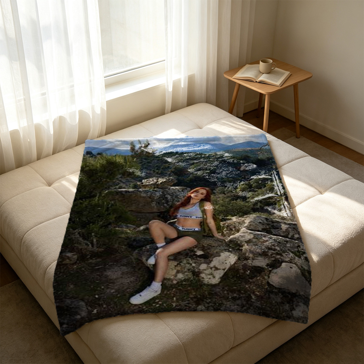 A brunette model in black lace lingerie and a brown satin robe, seated in a luxurious chair. - Blanket
