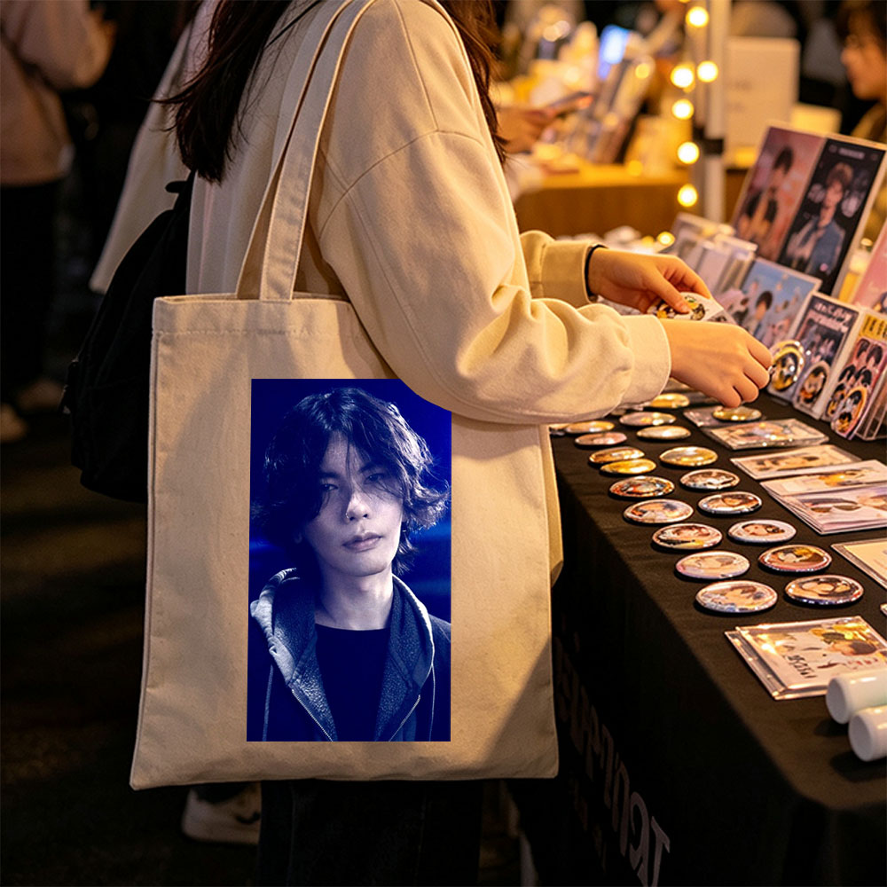 Yosuke Nagai in a dramatic scene with intense blue lighting and a stylish jacket - Canvas tote bags