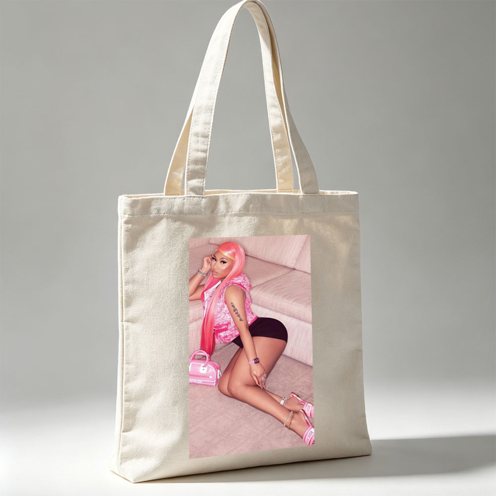 Nicki Minaj Sitting on Couch in Pink Outfit with Matching Accessories - Canvas tote bags