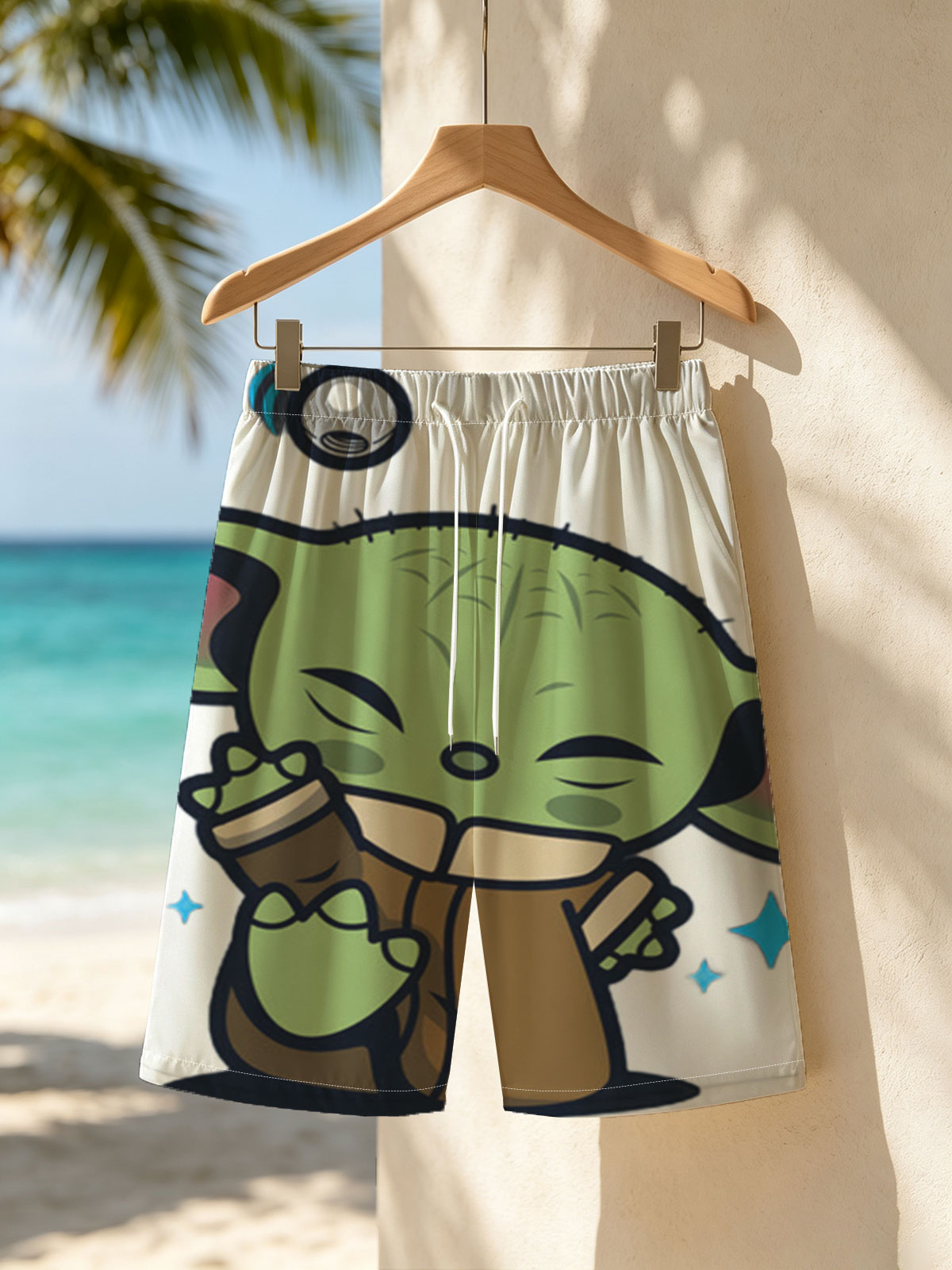 Baby Yoda Hugging a Cup with Stars and Droid in Background -  Beach shorts
