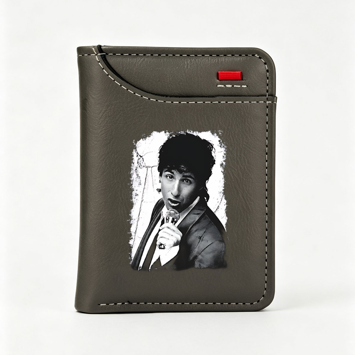 Adam Sandler performing with a microphone, black and white portrait - Vertical Style Wallet