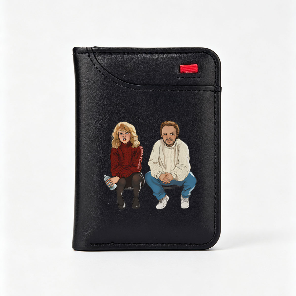 Two individuals seated, one in a red sweater holding a water bottle, the other in a white sweater and blue jeans. - Vertical Style Wallet