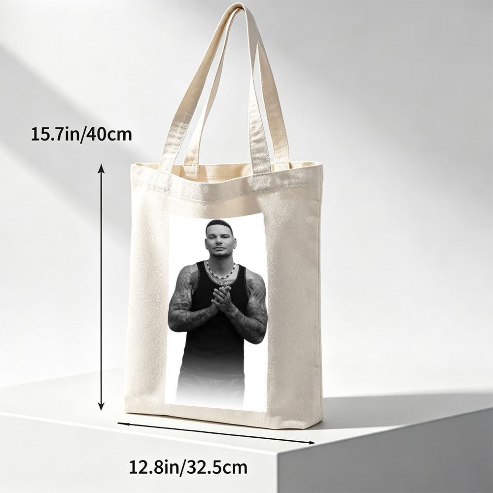Daddy Yankee Clapping in Black and White Portrait with Tattooed Arms and Beaded Necklace - Canvas tote bags