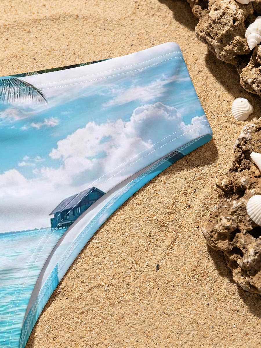 Tropical paradise with palm trees and overwater bungalows in crystal clear blue waters. -  Men's swim trunks
