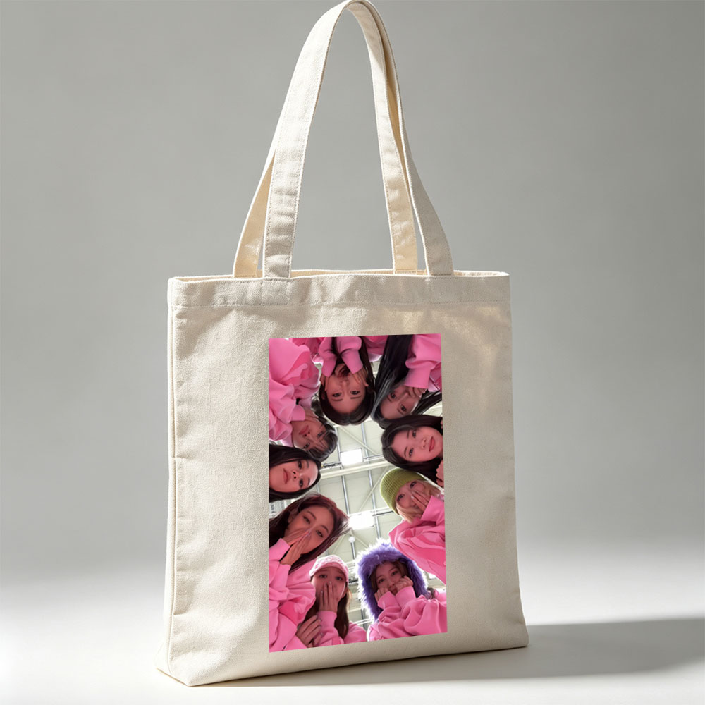 NewJeans Group Photo in Pink Outfits Forming a Circle with Playful Expressions - Canvas tote bags