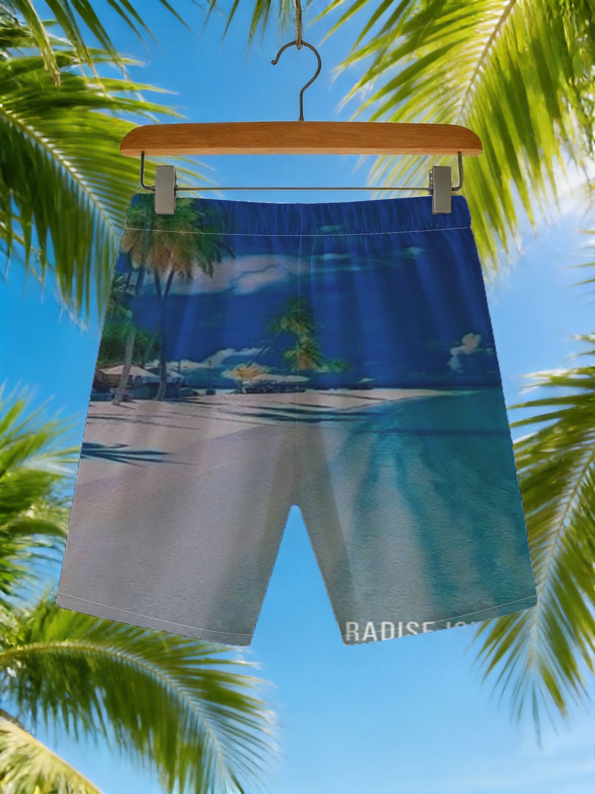 Serene beach with palm trees and turquoise waters under a clear blue sky. -  Beach shorts