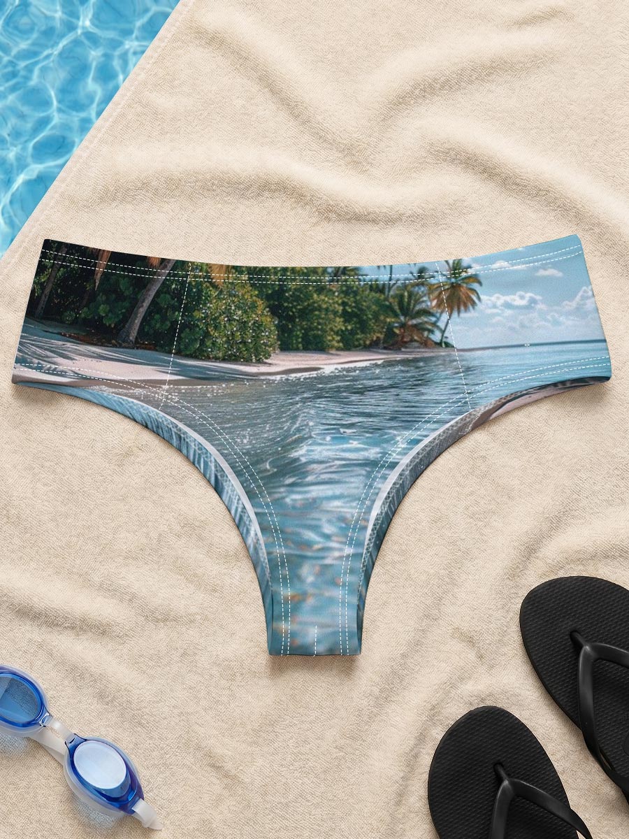 Crystal-clear waters lap against a serene tropical beach lined with swaying palm trees under a bright blue sky. -  Men's swim trunks