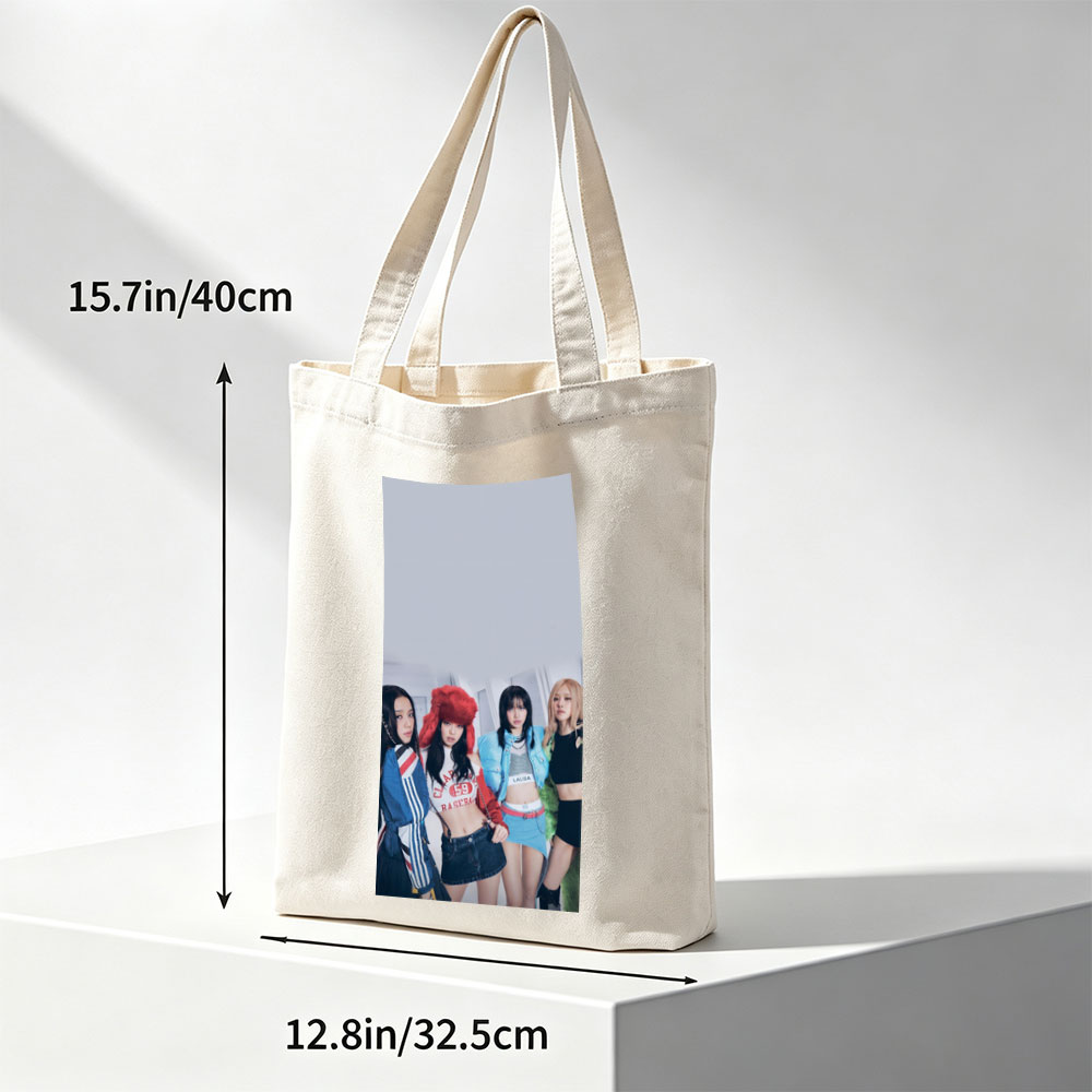 BLACKPINK in a stylish group photo wearing trendy outfits and posing confidently indoors - Canvas tote bags