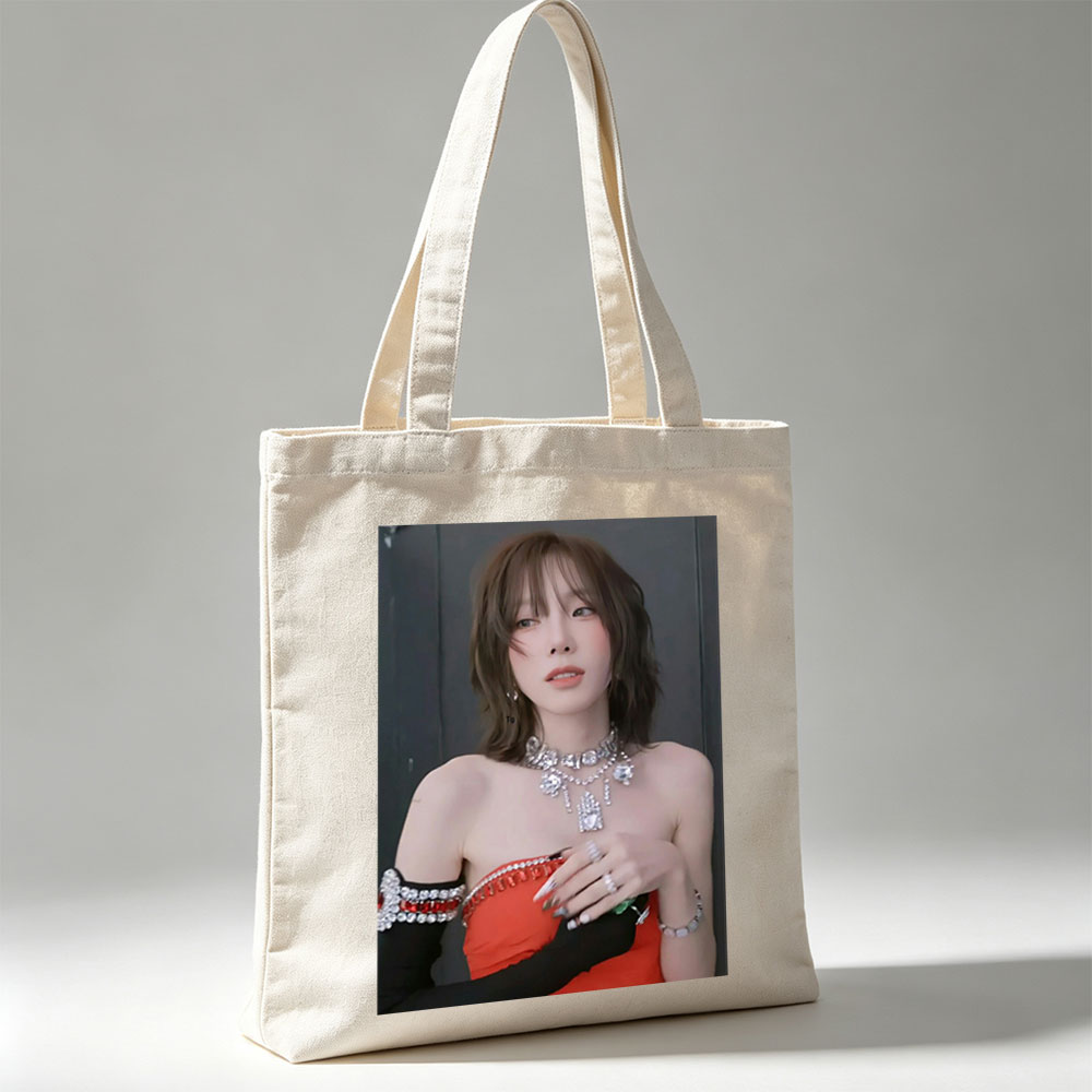Taeyeon in a glamorous red outfit with sparkling jewelry and bold accessories - Canvas tote bags