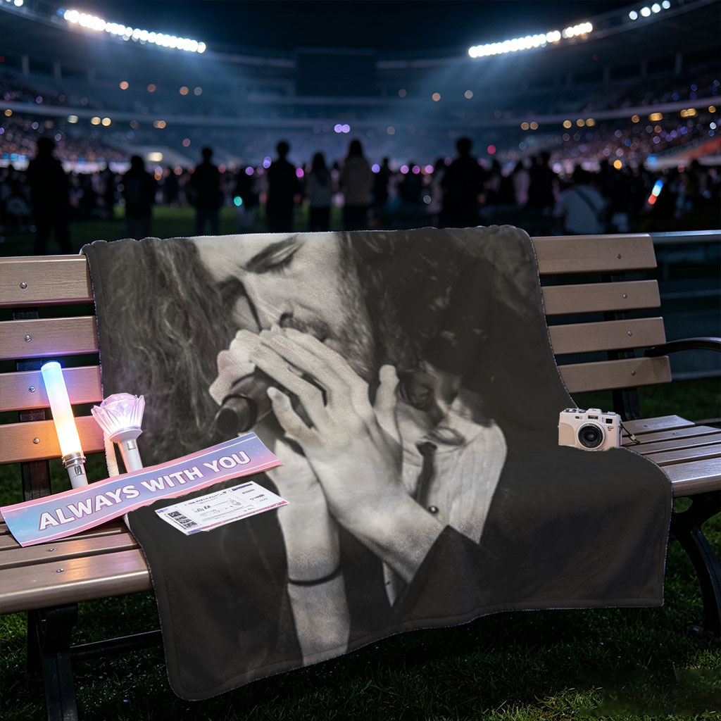 Hozier Performing on Stage Holding Microphone in Black and White - Blankets