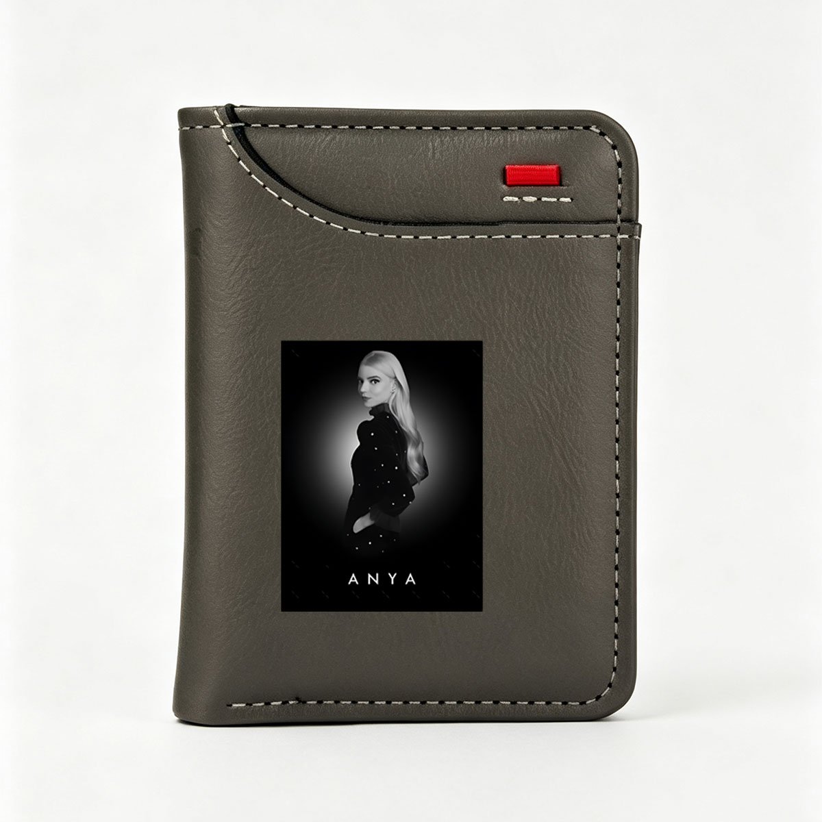 Anya Taylor-Joy in a striking black-and-white portrait, showcasing elegance and poise. - Vertical Style Wallet