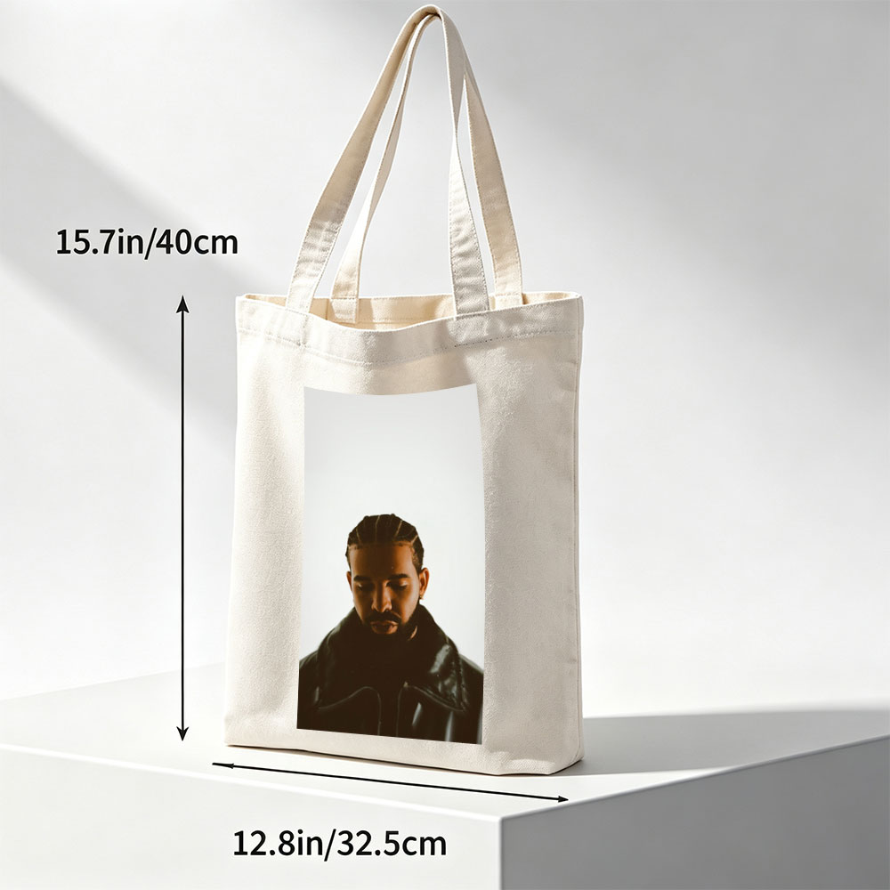 Drake in a Moody Portrait Wearing a Black Leather Jacket with Braided Hair and a Contemplative Expression - Canvas tote bags