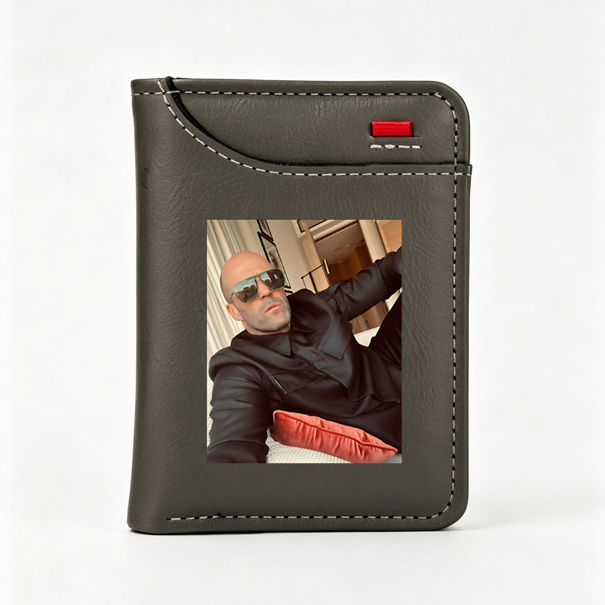 Jason Statham in Black Suit and Green Sunglasses, Relaxed Pose with Red Pillow - Vertical Style Wallet