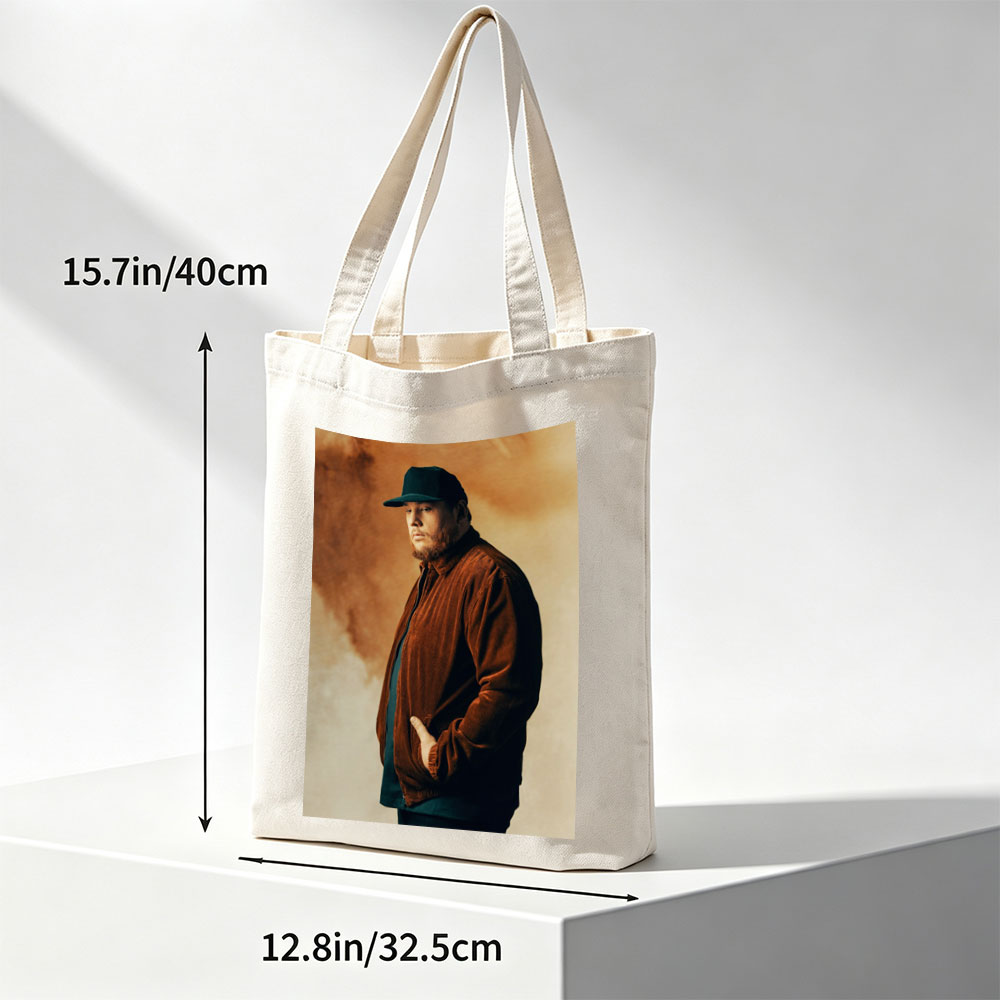 Luke Combs in a Studio Portrait Wearing a Brown Corduroy Jacket and Black Cap - Canvas tote bags