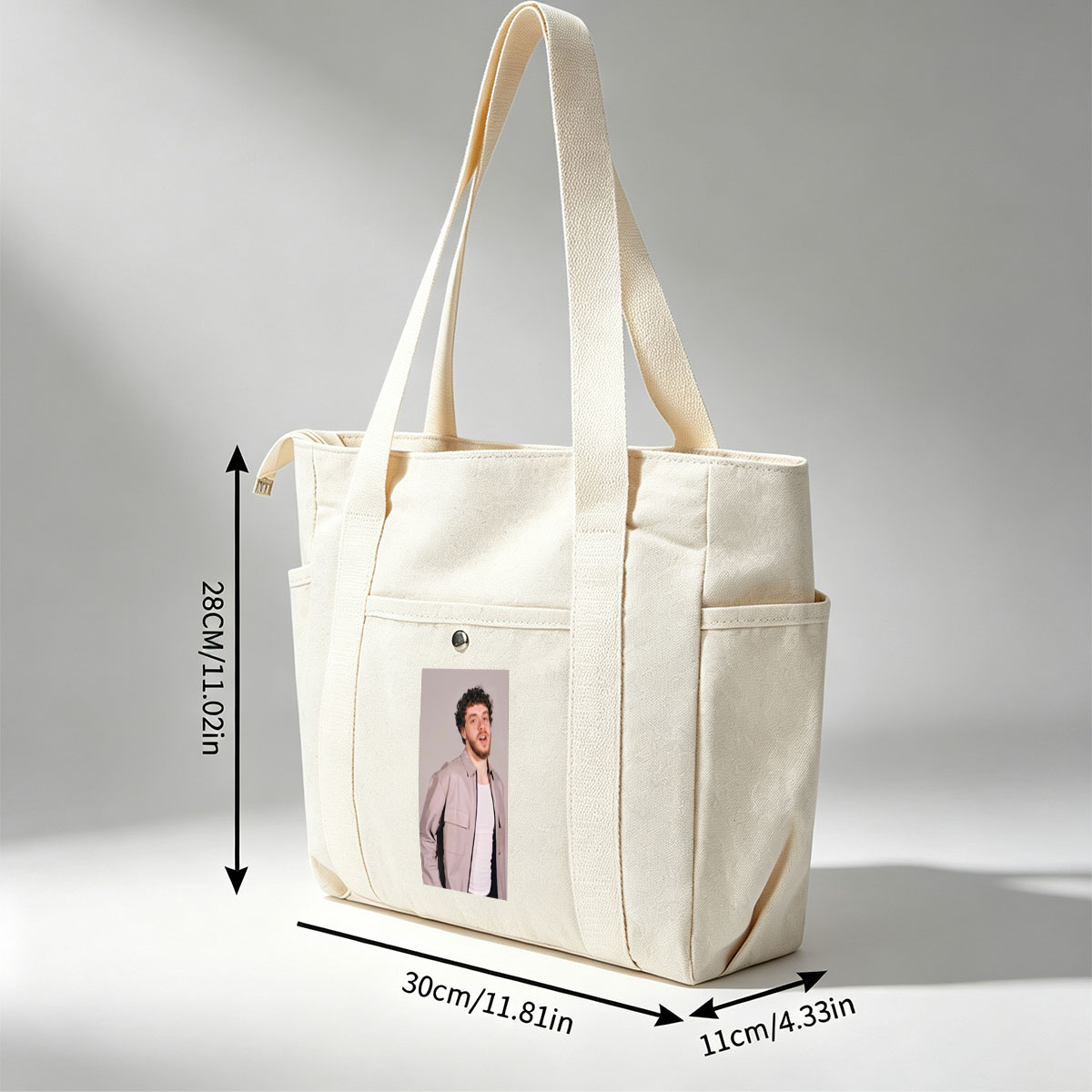 Jack Harlow in a Stylish Pose Wearing a Beige Jacket Over a White Shirt Against a Neutral Background - Multi-pocket bags