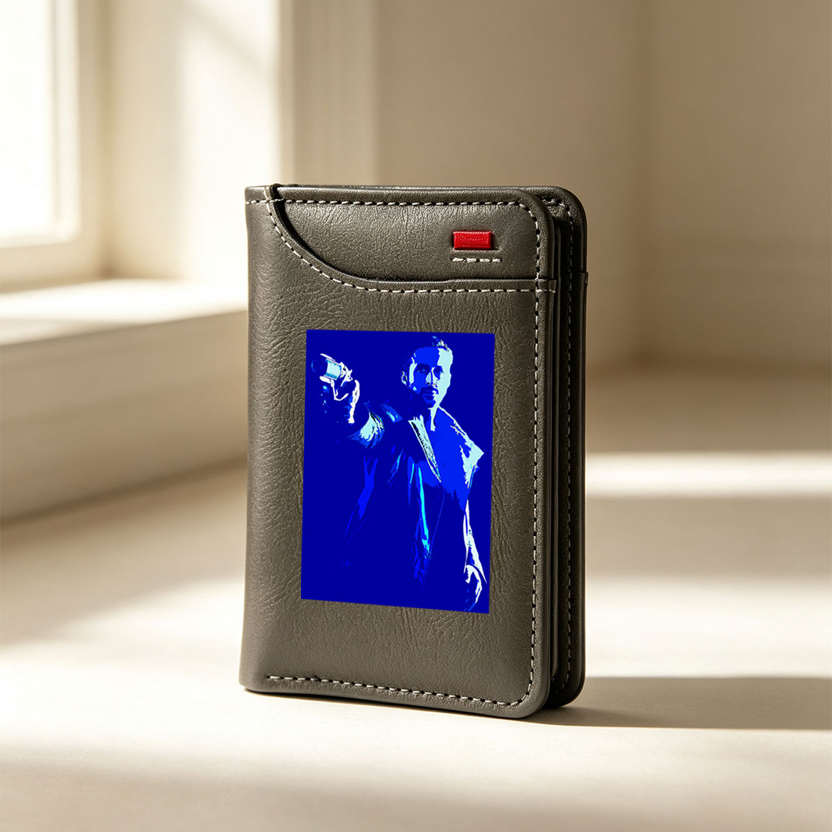 Ryan Gosling as Blade Runner in a blue-toned, stylized portrait holding a pistol. - Vertical Style Wallet